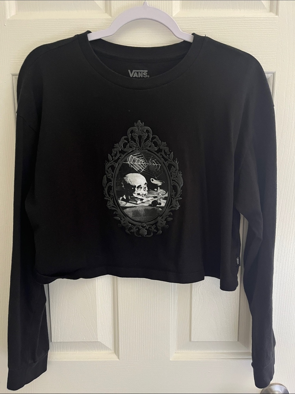 Vans Black Cropped Long Sleeve Tee with Gothic Skull Medallion